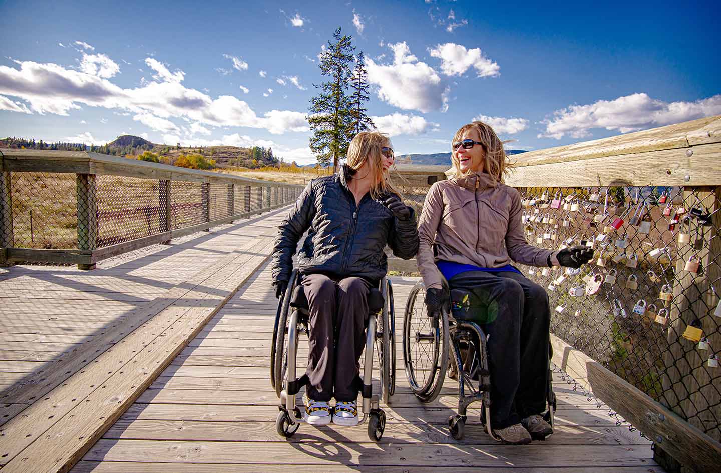 Two wheelchair users on the KVR Trail trestle